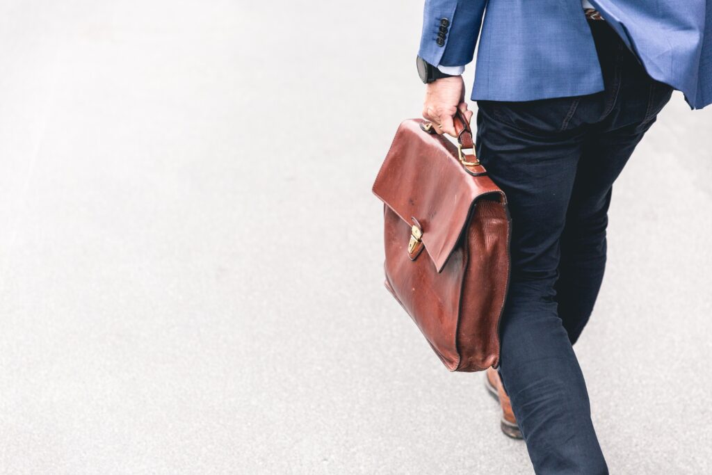 Personal injury claims: a man walking with a leather briefcase