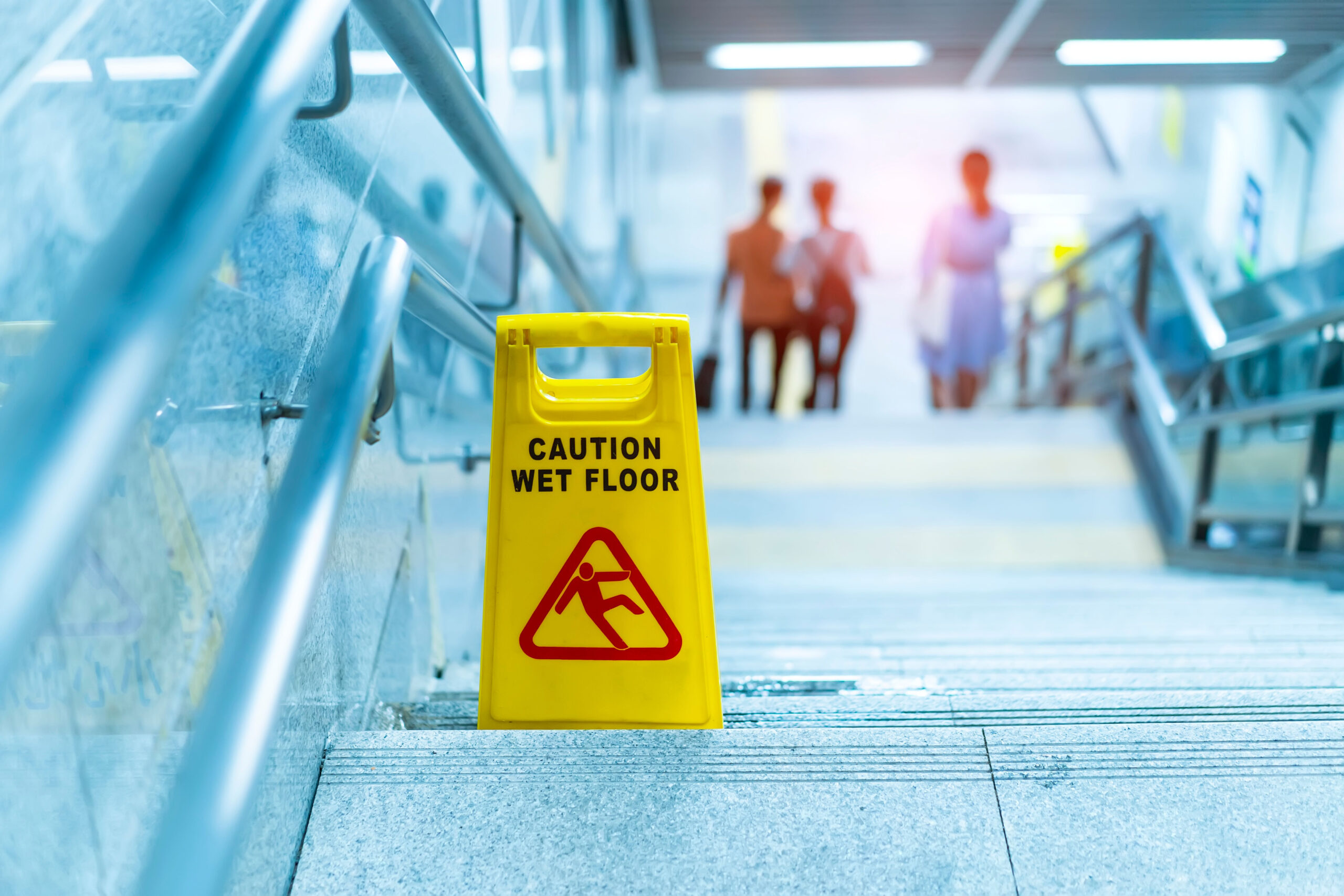 caution-wet-floor-sign-on-steps